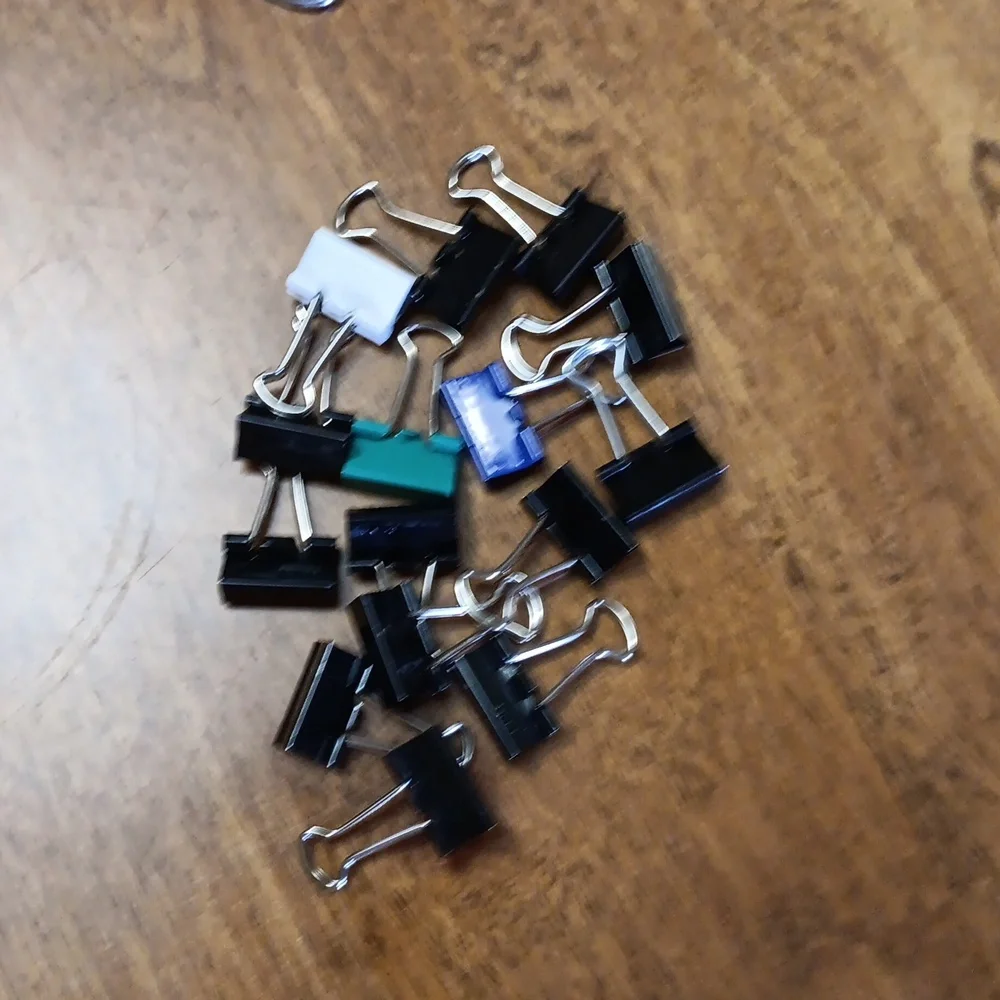 Assorted size binder paper Clips